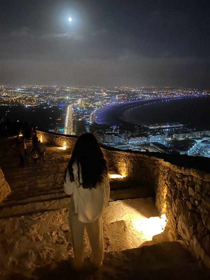 Agadir Oufella Kasbah night view city lights moon Morocco