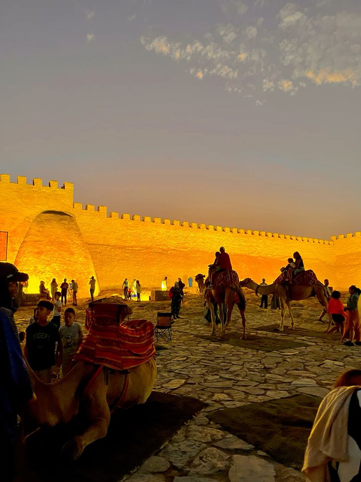 Agadir Oufella Kasbah camel ride sunset golden walls Morocco